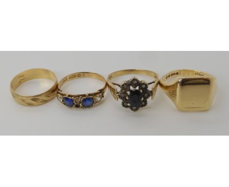 A 9ct signet ring, size S1/2, a sapphire and diamond retro cluster size R, a blue and clear gem ring, dated Birmingham 1896, 