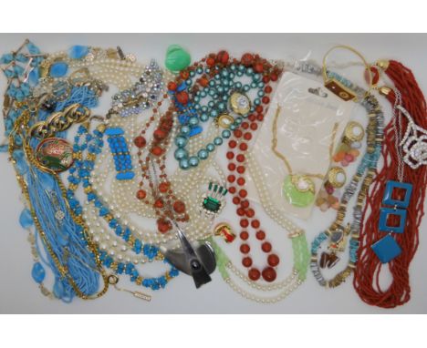 Vintage beads to include turquoise, brooches and other items Condition Report: Not available for this lot