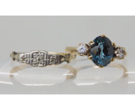 A 9ct vintage diamond accent ring size N, and a blue and clear gem set 9ct ring, size J1/2, combined weight 3.6gms Condition 