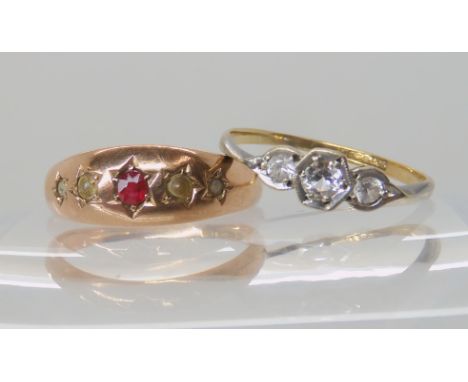 A 9ct three clear gem set ring, size O1/2, together with a 9ct ruby and pearl ring dated Chester 1902, size P1/2, weight comb