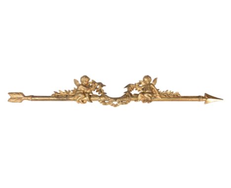 A CARVED GILTWOOD WALL MOUNT19TH CENTURY Modelled as cherubs seated upon an arrow26cm high, 168cm wide  Provenance: The Fulwo