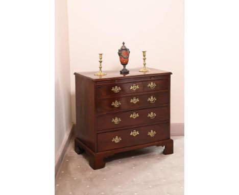 A GEORGE III MAHOGANY BACHELOR'S CHEST CIRCA 1780 With brushing slide above four long drawers74cm high, 79cm wide, 44cm deep 