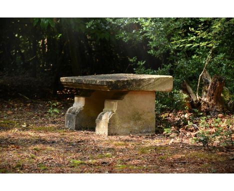 A STONE AND COMPOSITE STONE BENCH OR LOW TABLECOMPRISING ARCHITECTURAL ELEMENTS52cm high, 115cm wide, 69cm deep