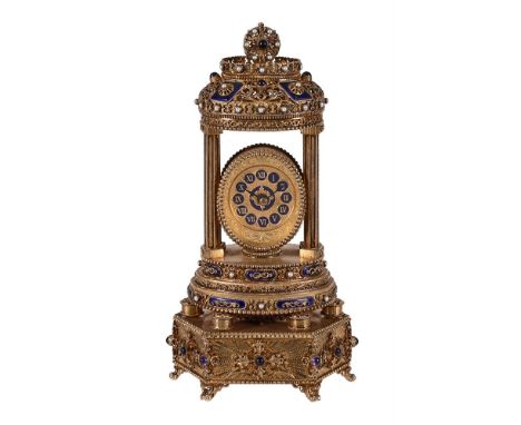 REUGE, SAINTE-CROIX A SWISS GILT METAL AND ENAMEL MUSICAL MANTEL CLOCK, 20TH CENTURYThe gilt case inlaid with seed pearls and