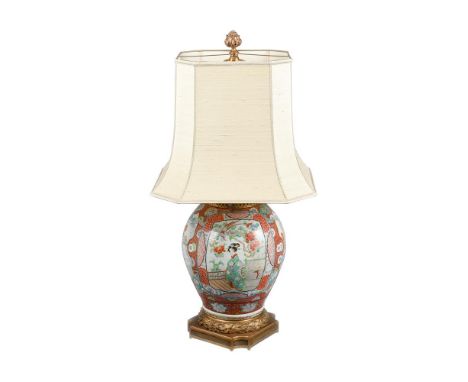 A JAPANESE ARITA PORCELAIN VASE19TH CENTURYWith later gilt mounts to top and base for use as a table lamp 112cm high overallP