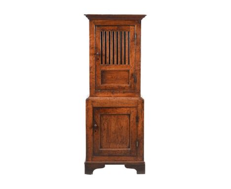 AN OAK 'HUTCH' OR FOOD CUPBOARD MID 18TH CENTURY 165cm high, 60.5cm wide, 44.5cm deep Provenance:The Fulwood CollectionWilkin