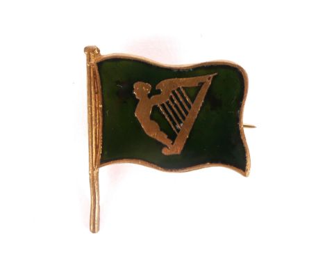 Early 20th Century Nationalist flag pin. A gilt metal and green enamel pin-back badge in the form of a green flag centred by 