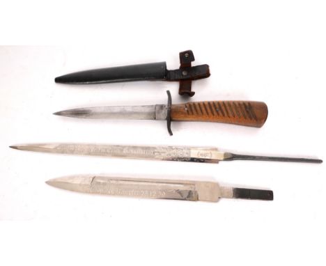 1914-1918 German trench knife and two German dagger blades. The trench knife in metal and leather scabbard; the dagger blades