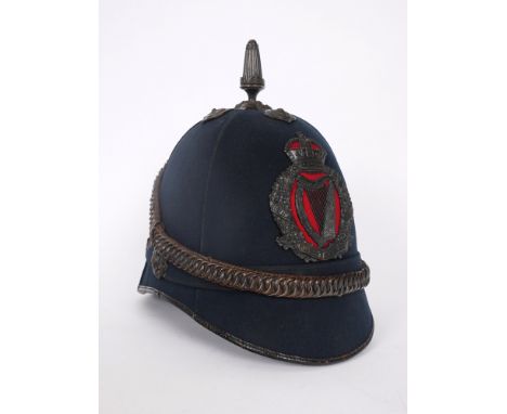 1902 pattern Royal Irish Constabulary helmet. Royal Irish Constabulary helmet, blue cloth with black fittings of pattern uniq