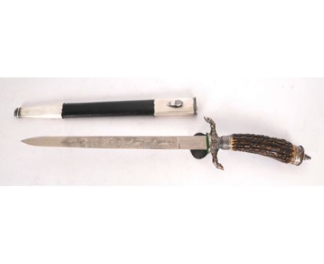 1932-1945 German Hunting Association dagger. The chrome steel blade double etched with hunting scenes, the hilt of gilt brass