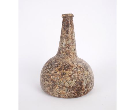 18th century onion-shaped glass bottle. A light green glass bottle with string rim, tapering neck and pontilled kick-up base,