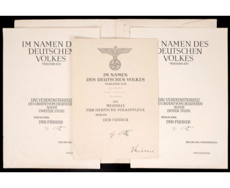 Germany. Military award certificates with printed signature of Adolf Hitler. Two unissued for "Das Verdienstkreuz Des Ordens 