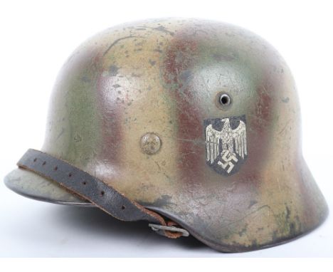 German Army Normandy Camouflaged Steel Combat Helmet, M-35 pattern steel combat helmet with single German army decal to the s