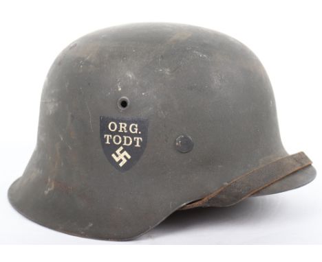 German Organisation Todt M-42 Steel Combat Helmet, having dark field grey combat paint finish to the interior and exterior of