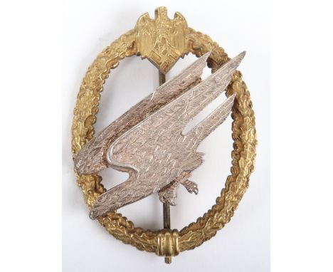 German Army (Heer) Paratroopers Qualification Badge, gilt metal wreath with down winged army eagle to the top and silvered di