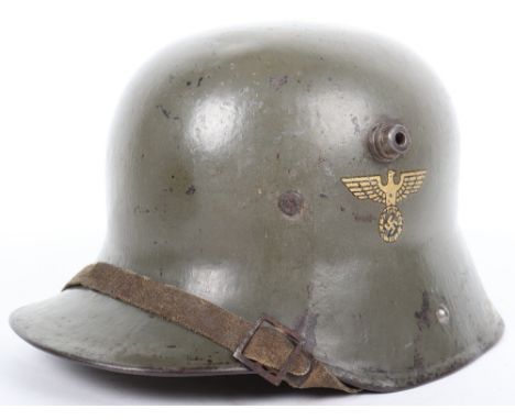 German Army M-17 Transitional Steel Helmet, retaining the field grey / green paint finish to the exterior and interior of the
