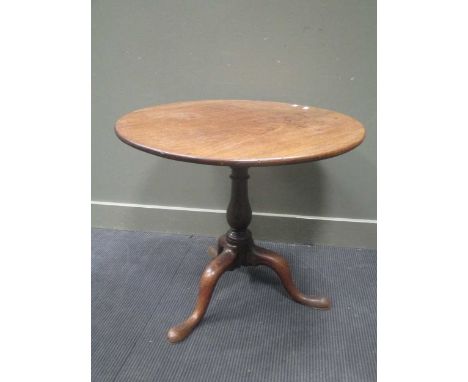 A George III mahogany tripod table with birdcage action 80cm diameter