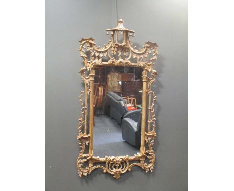 A modern Chinese Chippendale style gilt framed wall mirror, approximately 160 x 84cm