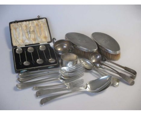 A collection of silver flatware together with a napkin ring and miniature trophy and a pair of silver backed hair brushes, 30