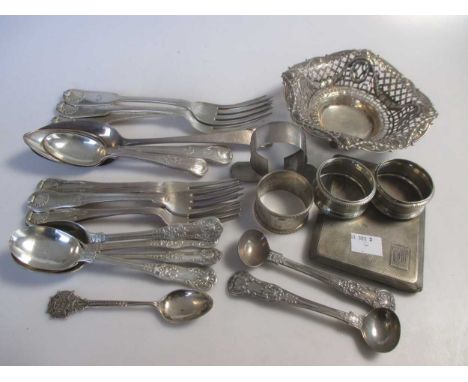 A collection of silver flatware together with 3 napkin rings, a watch holder a cigarette case and a bon bon dish, 35.4ozt gro