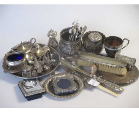 A collection of silver including sugar bowls, a waiter, condiment set, flatware, dressing table items, christening mug etc 38