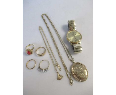 A collection of jewellery including a 9ct gold locket, a chain tested as 9ct gold and a 9ct gold gents diamond set signet rin