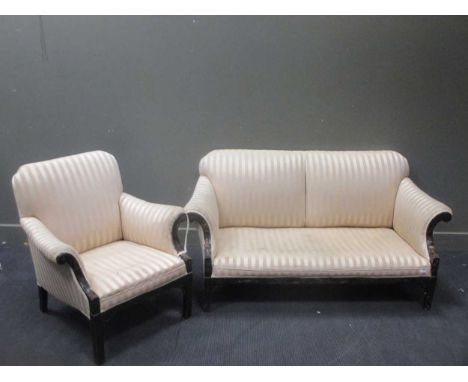 A Edwardian lacquer three piece suite with striped upholstery (two seater sofa and two armchairs), 170cm wide