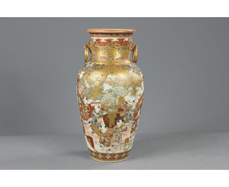 A Late 19th Century Japanese Kutani Vase, painted with figures beside the shore, approx 30 cms h, heightened with gilt and wh