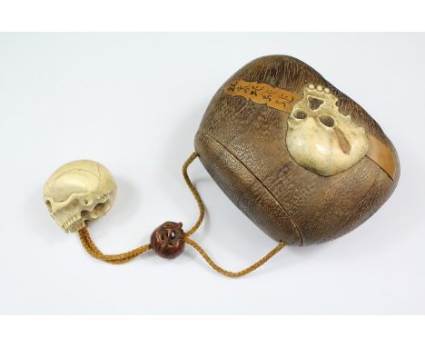 An Unusual 19th Century Japanese Sagemono, Ojime and Netsuke. The sagemono appears to be crafted from horn or possibly antler