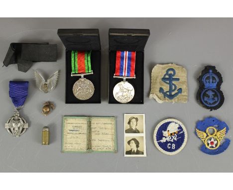 WWII Navy Ephemera to Fleet Air Arm Maisie Dorren Aris (nee Hume) Radio Mechanic. This lot includes George VI medal, George V