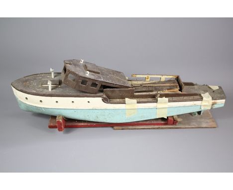 A vintage hand made steam fishing boat, painted with blue enamel, approx 80 cms l. (needs complete restoration)