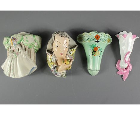 Art Deco ceramic wall pockets. This lot includes a Clarice Cliff example approx 17 x 20 cms; Burleigh Ware example approx 19 