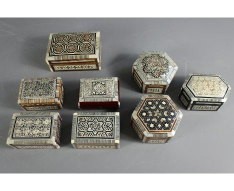 Eight Marquetry Boxes; intricately patterned in various shapes including one with mother of pearl from Egypt. (8)