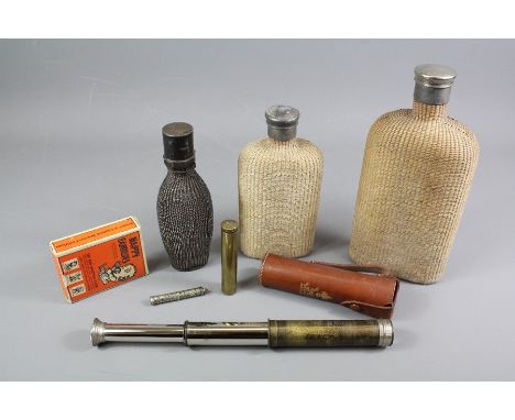 A Baden Powell Teliscout telescope, nr 315245, in the original case, brass powder flask nr 547, silver calendar and match hol