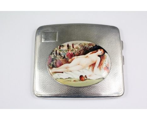 A silver and enamel cigarette case, the case having a feminine nude painted enamel cartouche, Chester hallmark, dated 1927, a