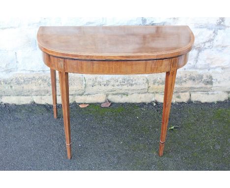 An Antique Mahogany Card Table; the table measures approx 91 x 87 x 74 cms (open), the interior covered in blue baize, having