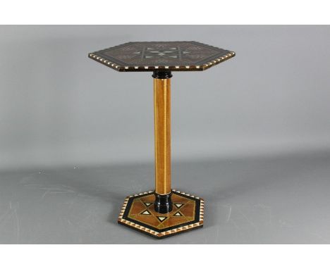 Marquetry wine table; the hexagon shaped table on central support pillar, approx 47 cms h.&nbsp;