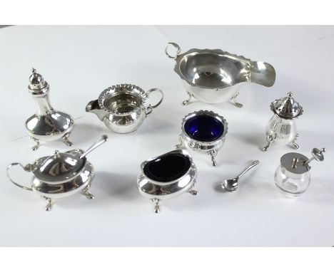 Miscellaneous silver; including a cruet trio, three further mustards (one clear glass with spoon), the other two with blue gl