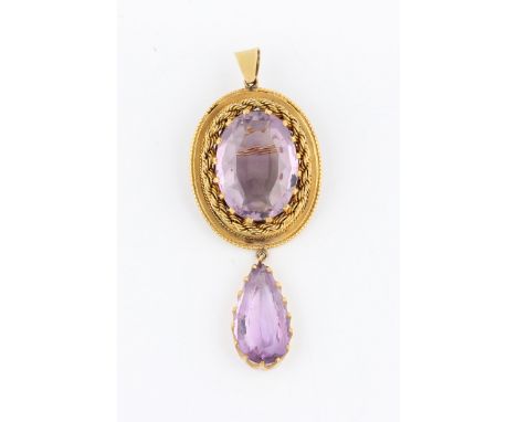 An amethyst pendant / brooch, set with a central oval cut amethyst, measuring approx. 23x17mm, surrounded by a rope twist bor