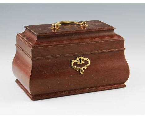 A reproduction Williamsburg Restoration shaped wooden tea caddy with brass handle and keyhole plate.