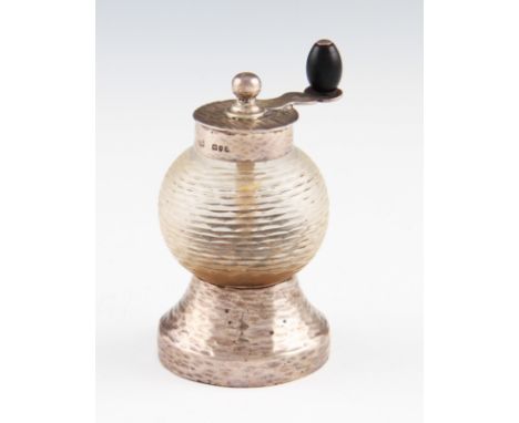 A Victorian silver mounted pepper grinder, of globular form, hallmarked London 1896, with makers mark JTH JHM for Hukin & Hea