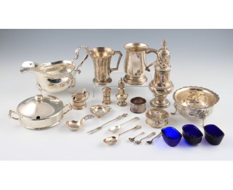 A collection of early to mid 20th Century hallmarked silver items to include a butter dish, sauce boat, sugar sifter, caddy s