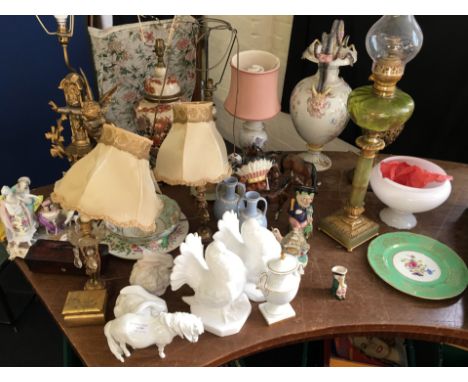 A lot to include Royal Doulton Indian Chief design character jug, Beswick, oil lamp and other lamps etc.