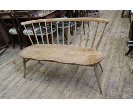 A beech and elm Ercol 'love seat', with stick back (as found)