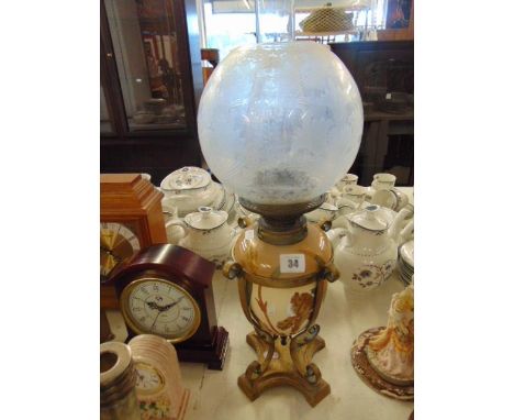 A hand painted Victorian oil lamp on Ormulu base