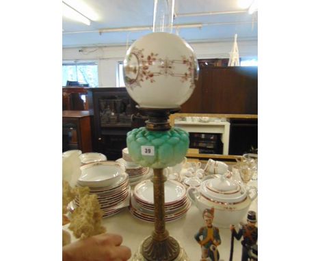 A Victorian oil lamp on marble base
