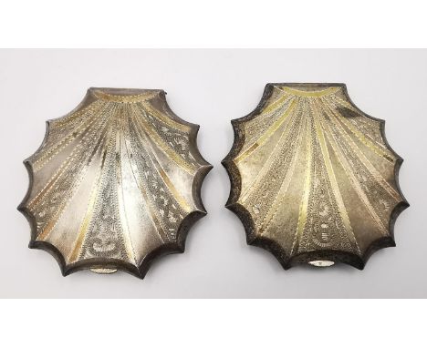 Two vintage Chinese engraved and gilded silver shell design ladies compacts. The front with an engraved gilt ray design to de