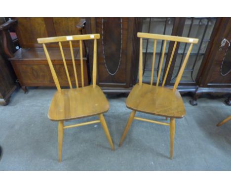 A pair of Ercol Blonde elm and beech 391 model chairs 