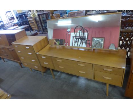 A Stag Concord light oak chest of drawers and dressing table, by John &amp; Sylvia Reid 