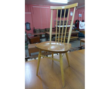 An Ercol Blonde elm and beech 608 model chair 